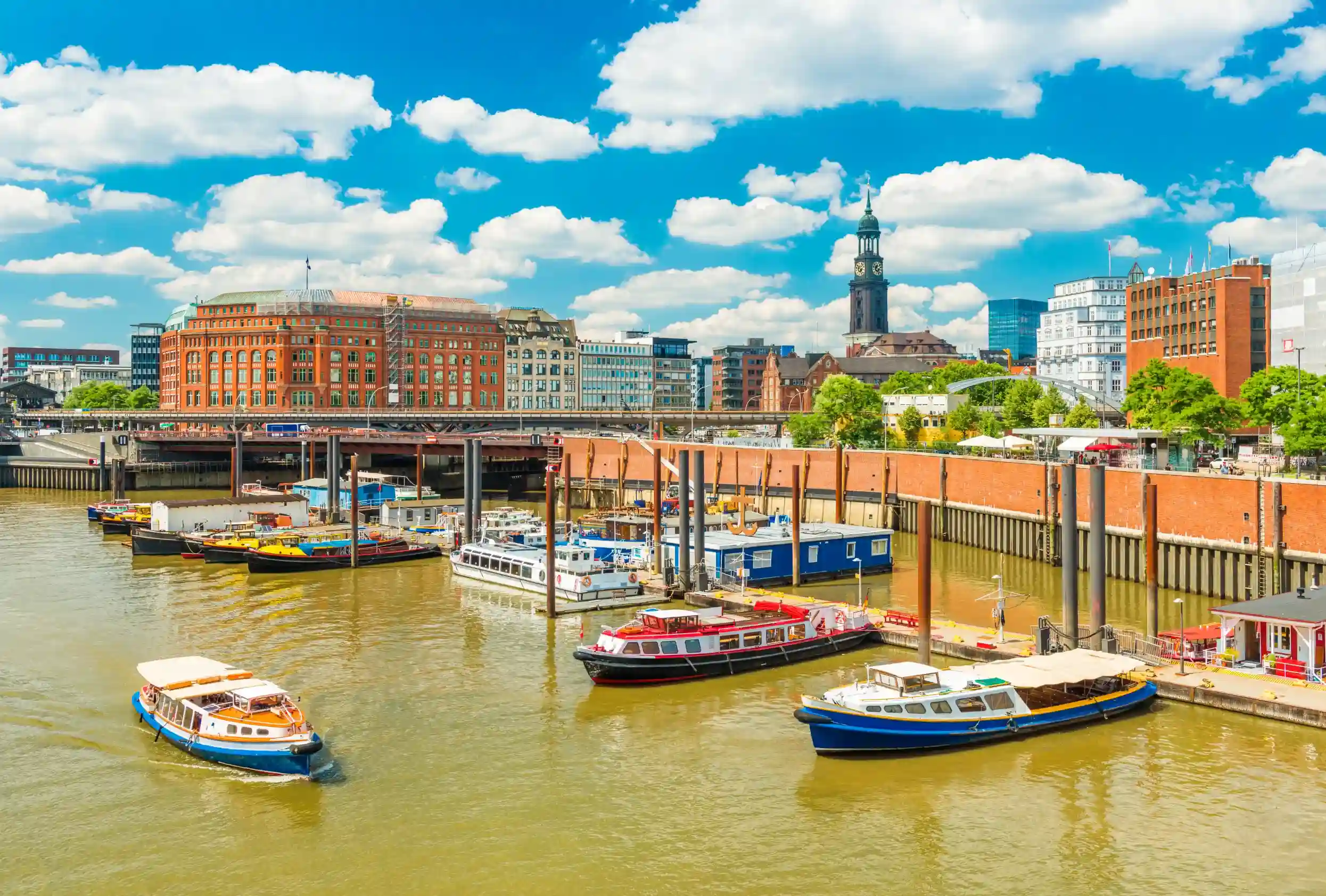 hamburg cityscape at sunny summer day view of the harbor with touristic boats