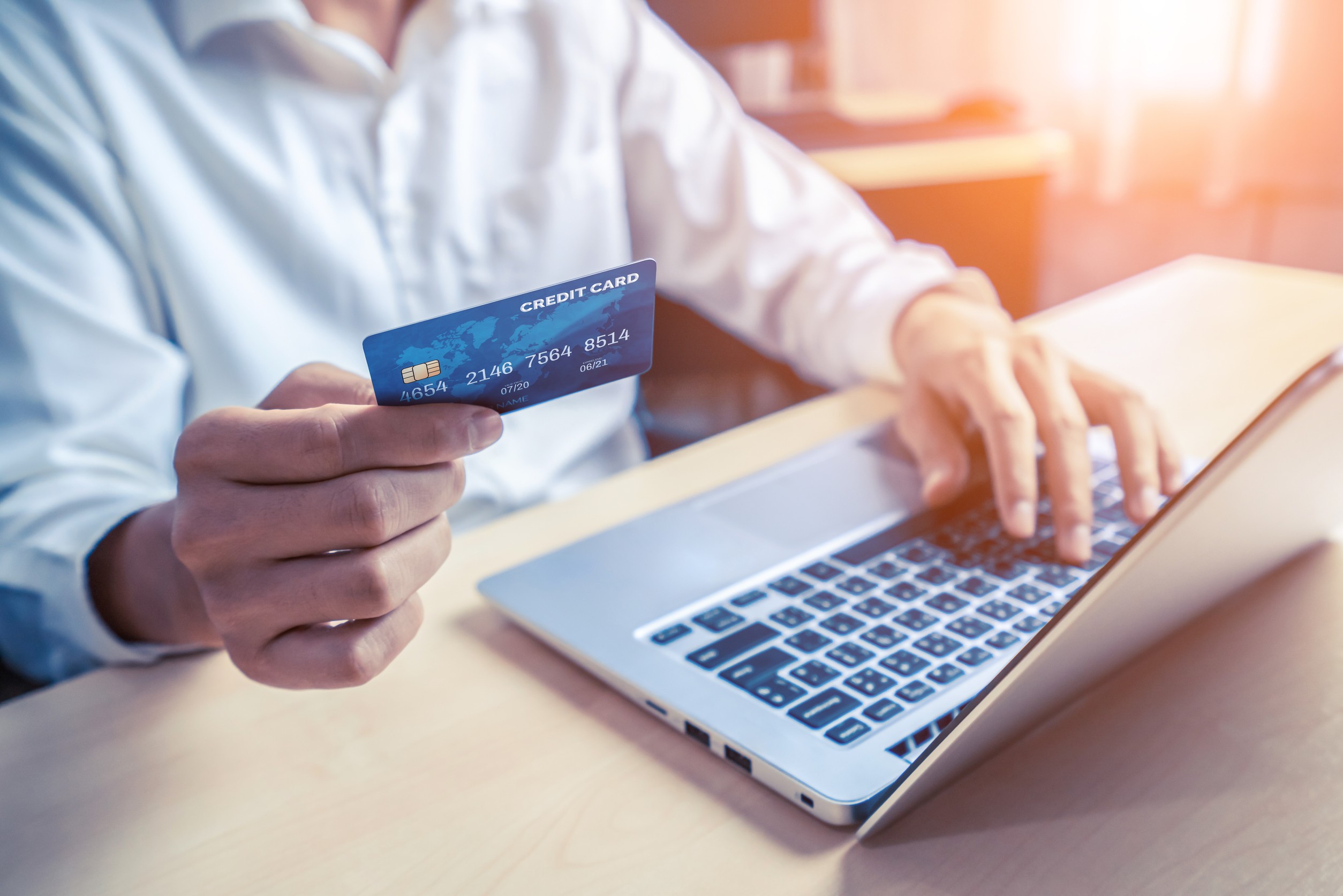 Person Making Online Payment With Card