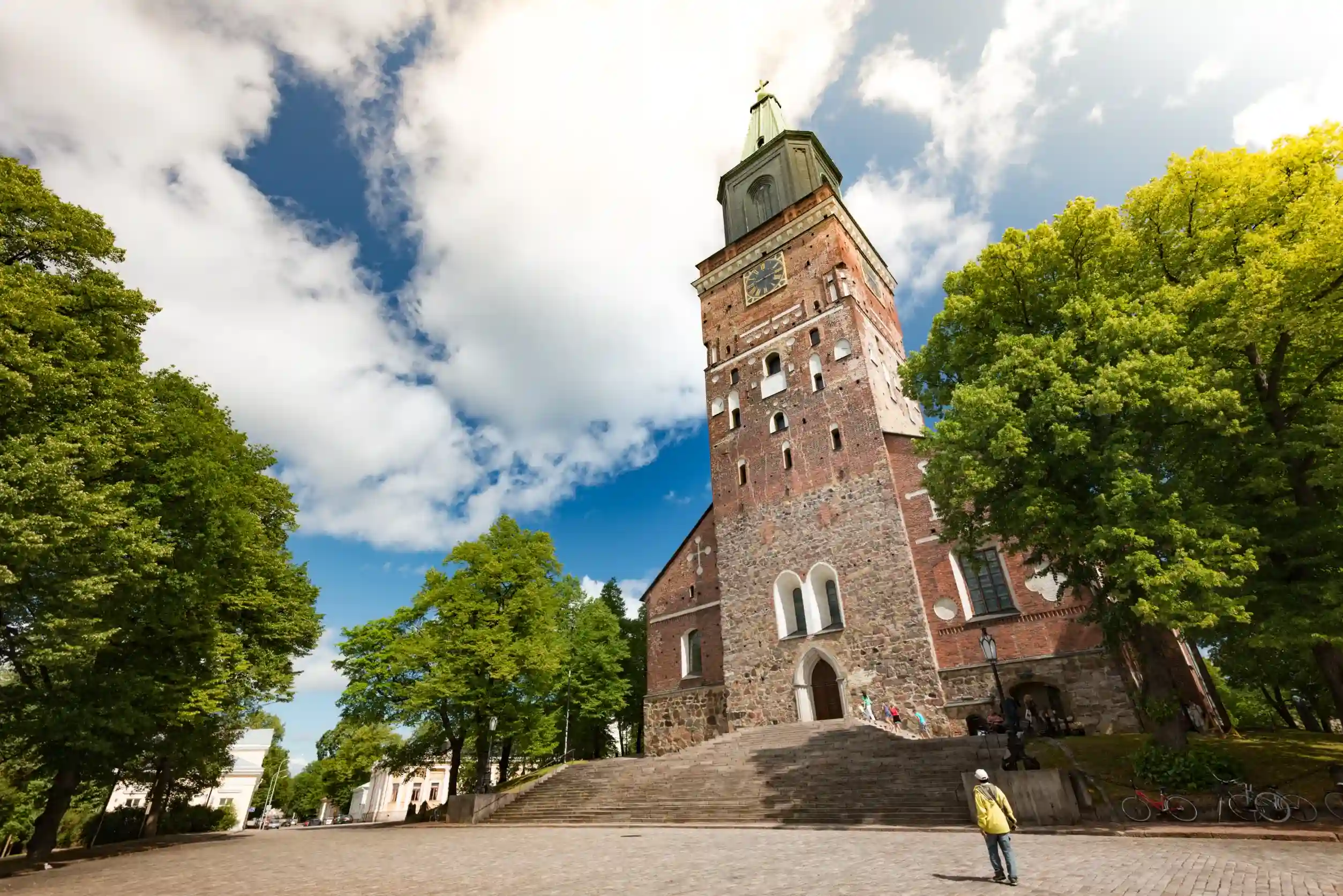 turku cathedral on sunny day with blue cloudy sky in background and square